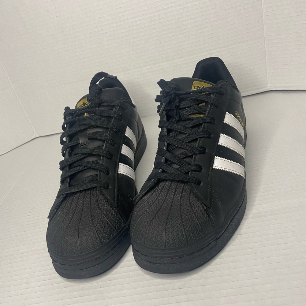 Black Adidas superstars